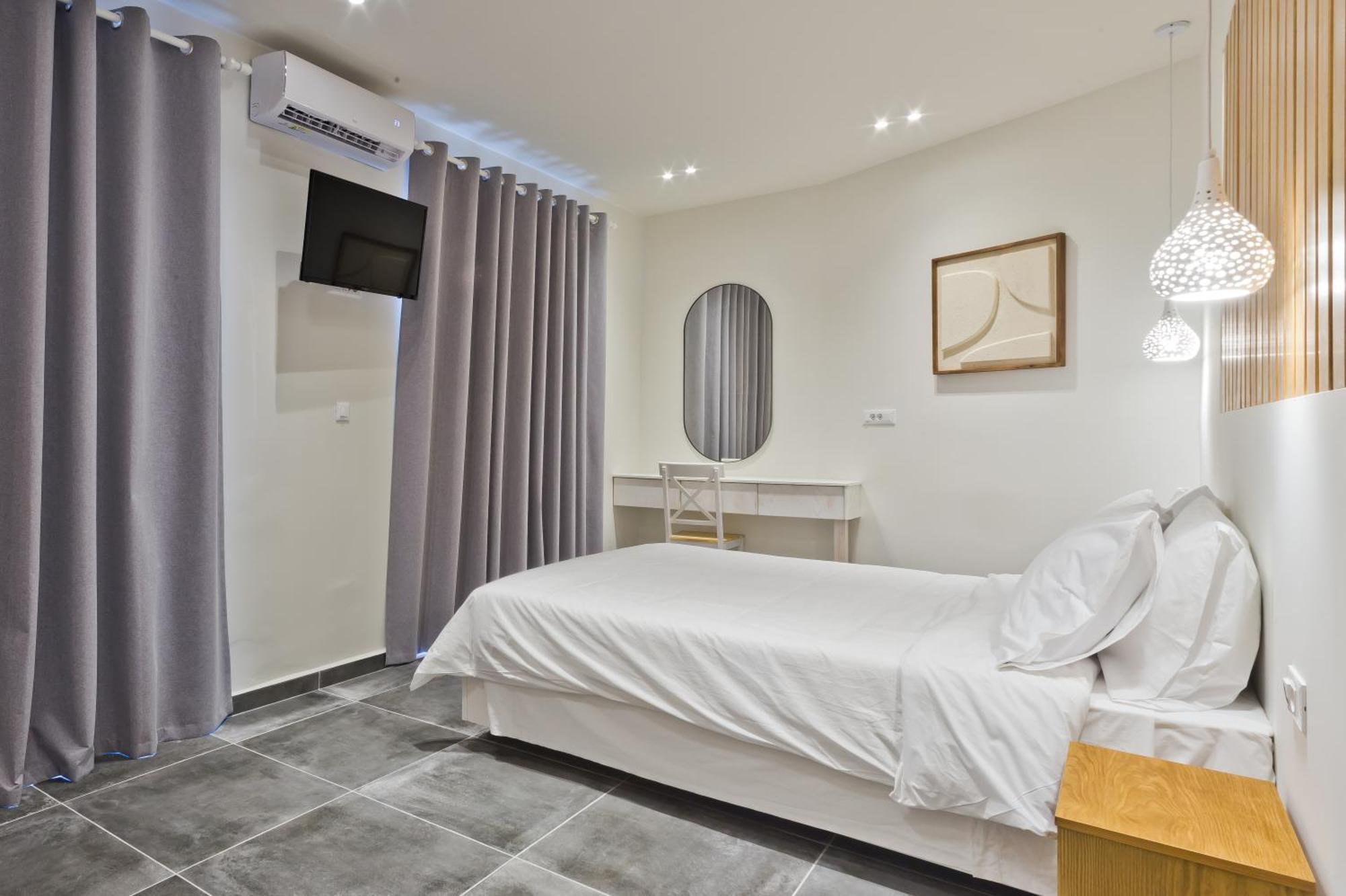 Posidonia Luxury Suites Karpathos Esterno foto